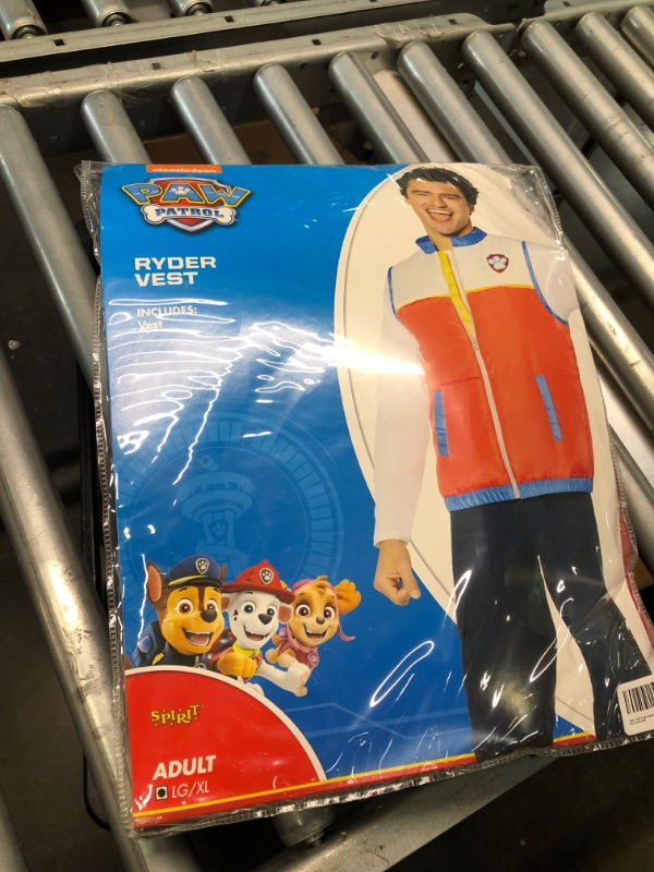 Photo 2 of Spirit Halloween Paw Patrol Adult Ryder Vest Costume | Officially Licensed | TV and Movie Costume | Easy Halloween Costume