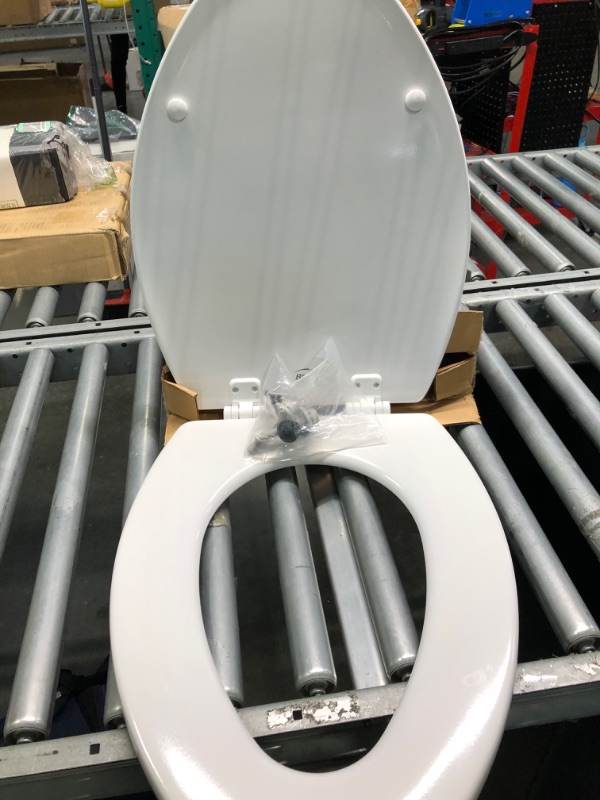 Photo 1 of Bemis 1500EC 390 Lift-Off Wood Elongated Toilet SEAT, Cotton White