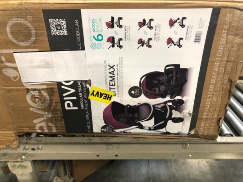Photo 1 of Evenflo Pivot Modular Travel System With SafeMax Car Seat Only Travel System Dusty Rose