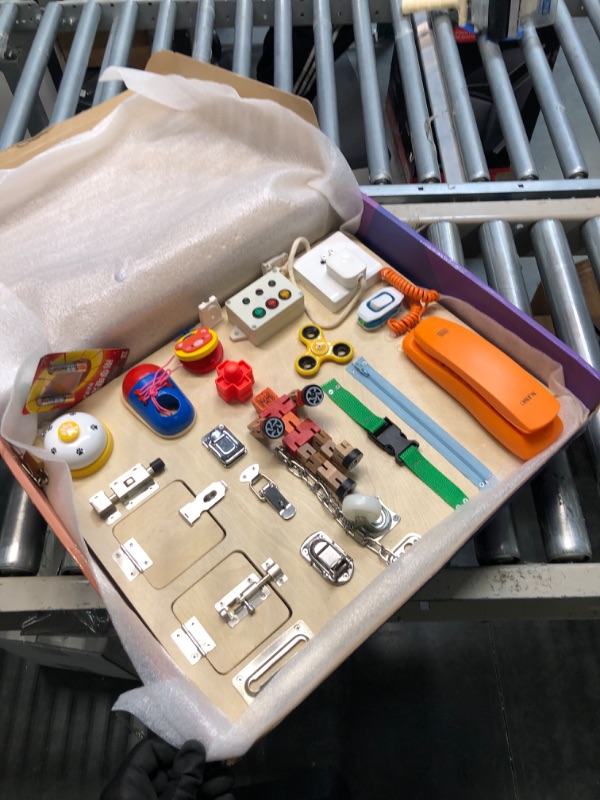 Photo 2 of Montessori Busy Board for Toddlers-Busy Board Toys Learn to Dress Toys for 1 2 3 4 Year Old Kids - Learning Toy for Airplane or Car Travel-20-in-1 Yellow

few pieces broken inside, but super glue will fix it. all other items functioning