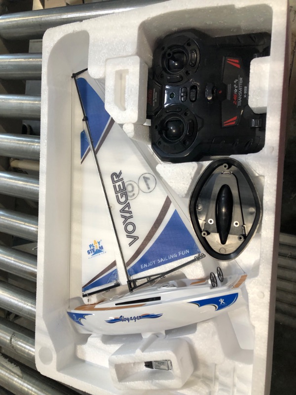 Photo 1 of PLAYSTEAM Voyager 280 RC Controlled Wind Powered Sailboat in Blue - 17.5" Tall