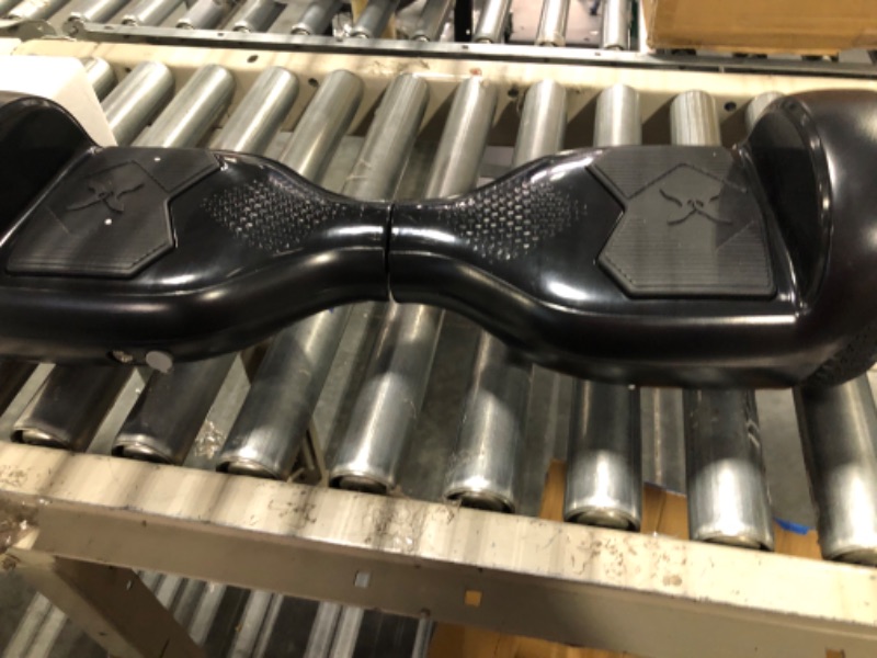Photo 1 of Hover-1 Helix Electric Hoverboard | 7MPH Top Speed, 4 Mile Range, 6HR Full-Charge, Built-in Bluetooth Speaker, Rider Modes: Beginner to Expert Hoverboard Black