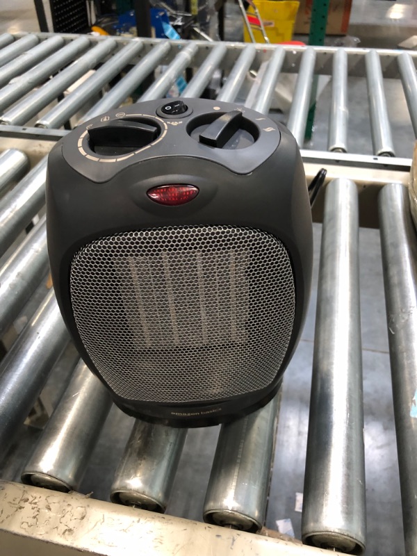 Photo 1 of Amazon Basics 1500W Oscillating Ceramic Heater with Adjustable Thermostat, Black Black Heater with Oscillating