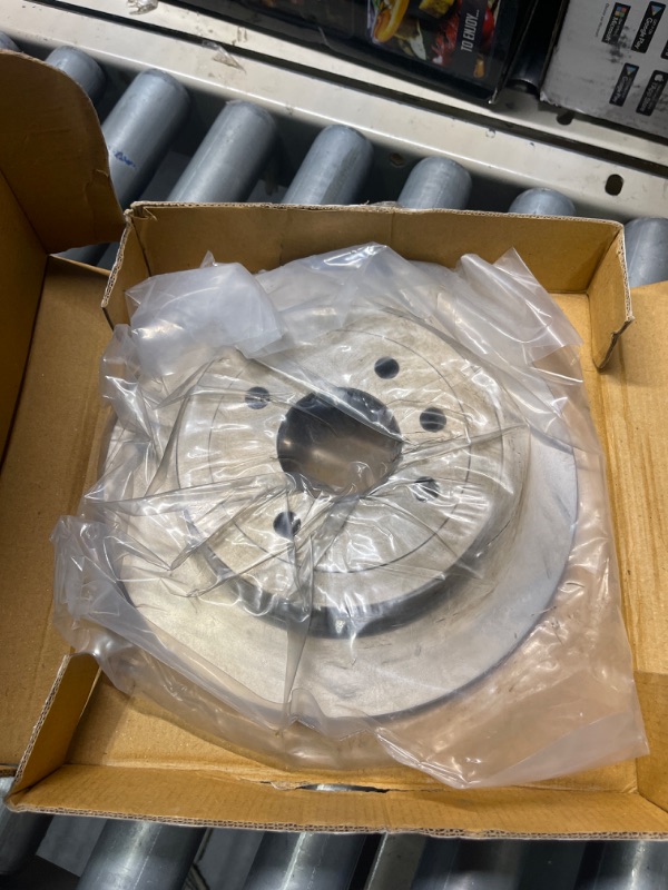 Photo 1 of Rear Dynamic Friction Company Disc Brake Rotor 600-03041 (1) For 2012-2017 Kia Rio, 2012-2022 Hyundai Accent, 2013-2014 Dodge Attitude Silver