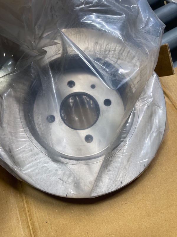 Photo 1 of Rear Dynamic Friction Company Disc Brake Rotor 600-03041 (1) For 2012-2017 Kia Rio, 2012-2022 Hyundai Accent, 2013-2014 Dodge Attitude Silver