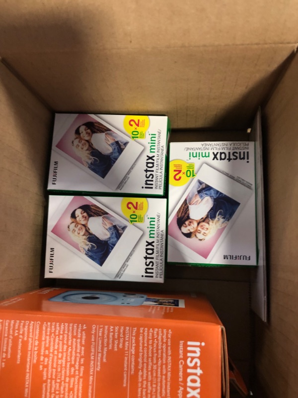 Photo 1 of Fujifilm Instax Mini 11 Camera with Fujifilm Instant Mini Film (60 Sheets) Bundle with Deals Number One Accessories Including Carrying Case, Selfie Lens, Photo Album, Stickers (Sky Blue)