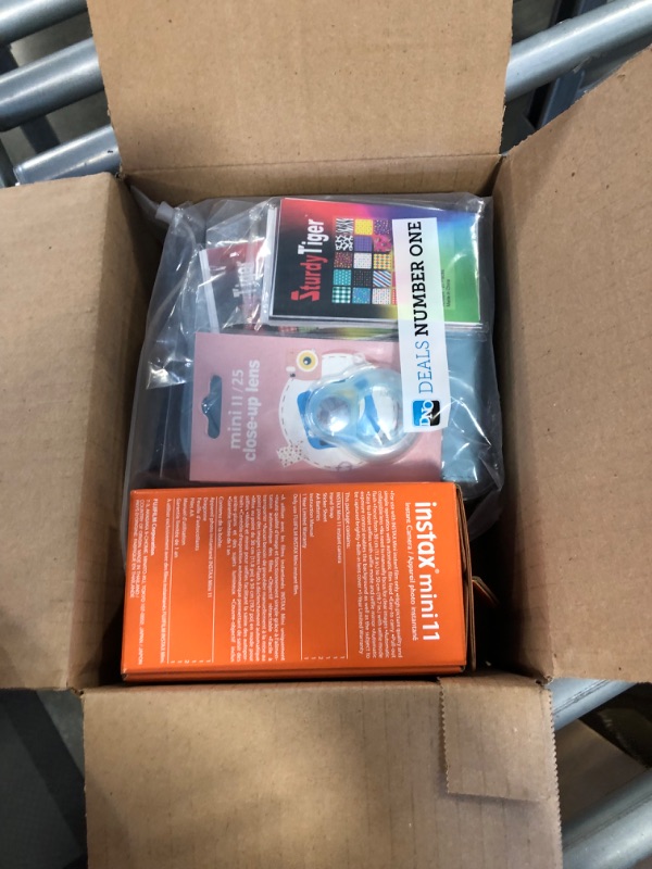 Photo 1 of Fujifilm Instax Mini 11 Camera with Fujifilm Instant Mini Film (60 Sheets) Bundle with Deals Number One Accessories Including Carrying Case, Selfie Lens, Photo Album, Stickers (Sky Blue)