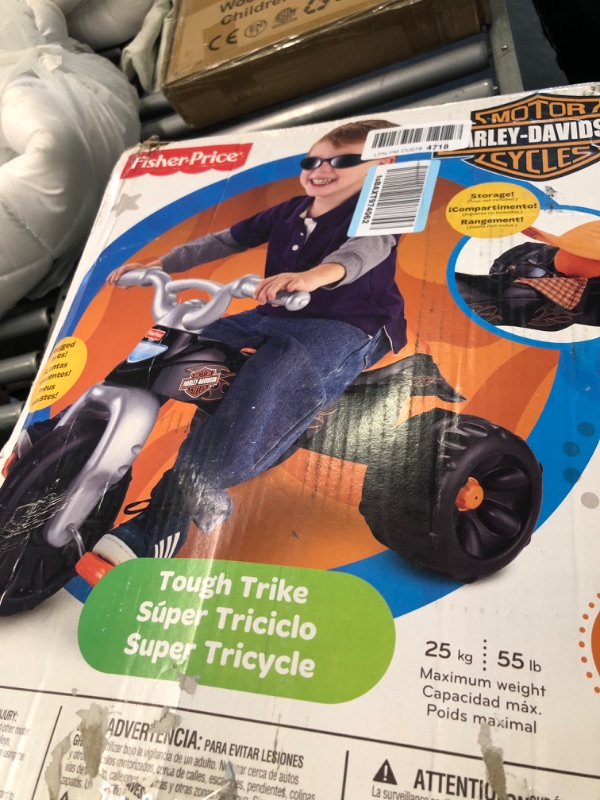 Photo 2 of Fisher-Price Harley-Davidson Tricycle with Handlebar Grips and Storage Area, Multi-Terrain Tires, Tough Trike [Amazon Exclusive]