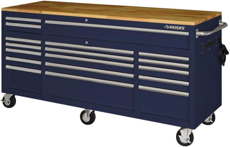 Photo 1 of ***FOR PARTS ONLY***
****************************
Husky 52 in. 18-Drawer Mobile Workbench with Solid Wood Top in Gloss Blue, HOTC7218B31M

***MISSING FRONT WHEELS****
