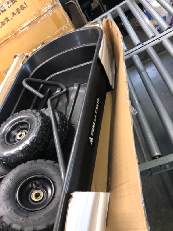 Photo 1 of ***FOR PARTS ONLY - Missing fram  Gorilla Carts GOR4PS Poly Garden Dump Cart with Steel Frame and 10-in. Pneumatic Tires, 600-Pound Capacity, Black