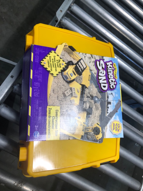 Photo 2 of Kinetic Sand, Construction Site Folding Sandbox with Toy Truck and 2lbs of Play Sand, Sensory Toys for Kids Ages 3 and up