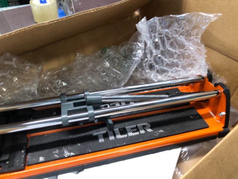 Photo 3 of ***SIGNS OF USE*** TILER 17 Inch Manual Tile Cutter, Professional Porcelain Ceramic Tile Cutter with Chrome Plated Solid Rails, Tungsten Carbide Cutting Wheel, Adjustable Fence Gauge, Anti-Skid Feet 8103E-2 Orange-17 Inch