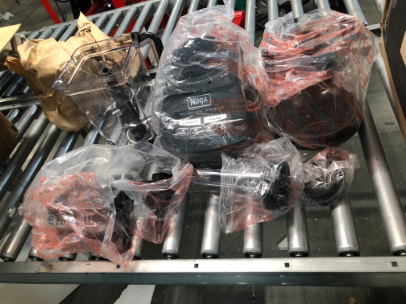 Photo 1 of Ninja BL770 Mega Kitchen System, 1500W, 4 Functions for Smoothies, Processing, Dough, Drinks & More, with 72-oz.* Blender Pitcher, 64-oz. Processor Bowl, (2) 16-oz. To-Go Cups & (2) Lids, Black Black with 2 Nutri Ninja Cups + Lids