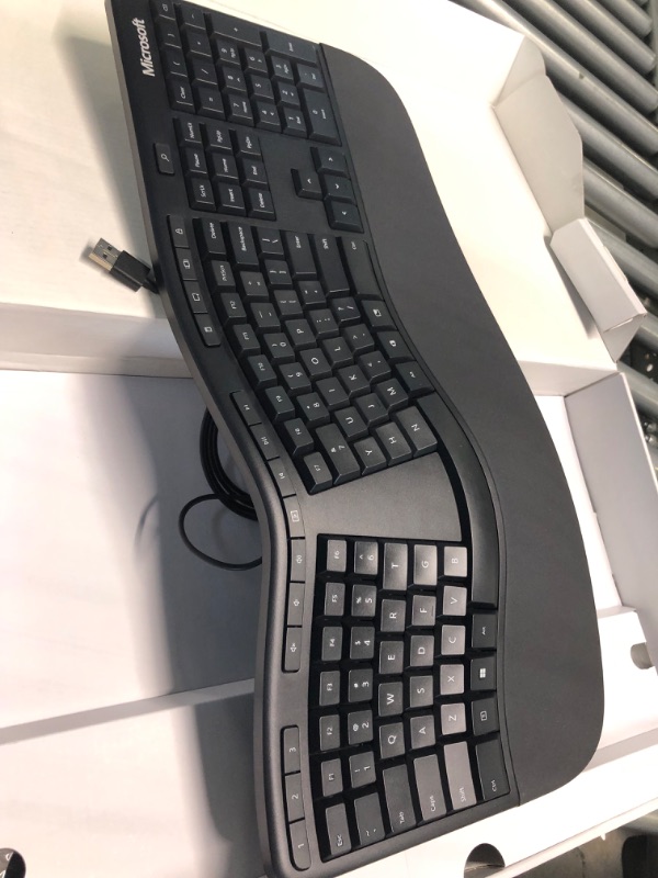 Photo 4 of Microsoft Ergonomic Keyboard - Black. Wired, Comfortable, Ergonomic Keyboard with Cushioned Wrist and Palm Support. Split Keyboard. Dedicated Office Key.