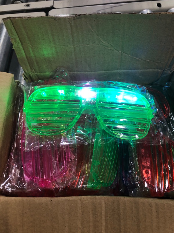 Photo 2 of LED Glasses Glow in the Dark Party Favors Supplies for Kids 24 Pack Flashing Plastic Light Up Glasses Toys Bulk 3 Replaceable Battery Flashing Light fit Halloween Party Toy Concert Birthday Holiday