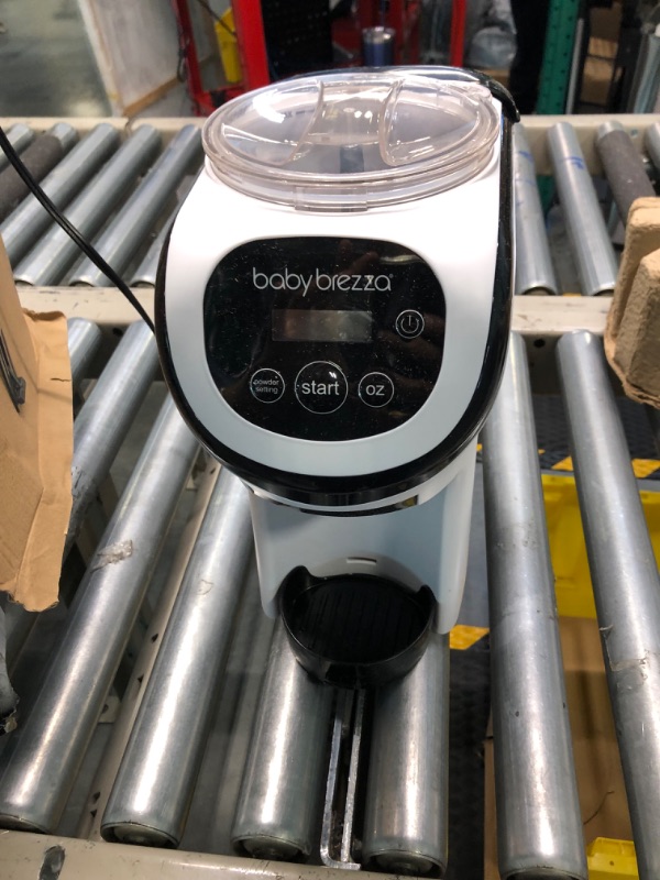 Photo 1 of Baby Brezza Formula Pro Mini Baby Formula Maker – Small Baby Formula Mixer Machine Fits Small Spaces and is Portable for Travel– Bottle Makers Makes The Perfect Bottle for Your Infant On The Go Formula Pro Mini Dispenser Machine