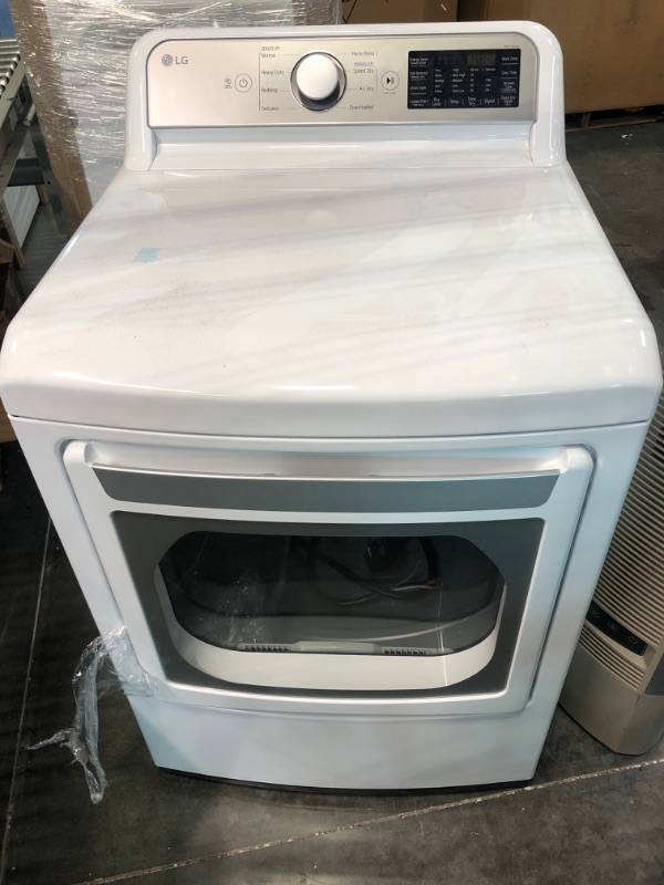 Photo 2 of LG DLG7301WE 7.3 Cu. Ft. White Ultra Large Capacity Smart Top Load Gas Dryer