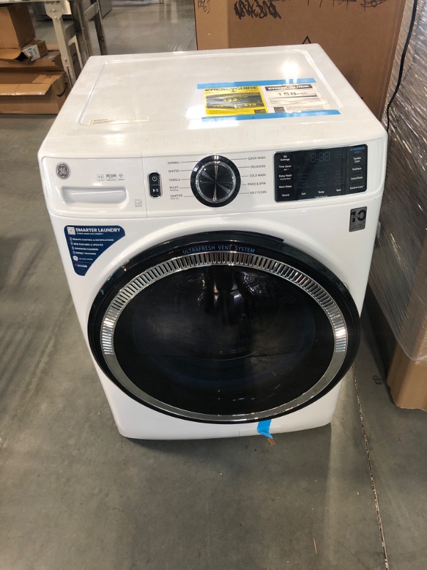 Photo 2 of GE GFW550SSNWW 28" Front Load Washer with 4.8 cu. ft. Capacity UltraFresh Vent System with OdorBlock Microban Antimicrobial Technology and Built-in WiFi in White