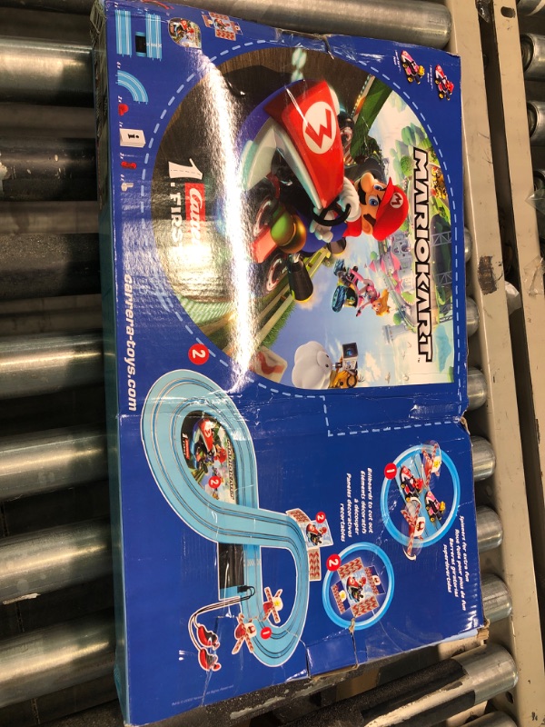 Photo 2 of Carrera First Mario Kart - Slot Car Race Track with Spinners - Includes 2 Cars: Mario and Peach - Battery-Powered Beginner Racing Set for Kids Ages 3 Years and Up Mario Kart w/ Peach