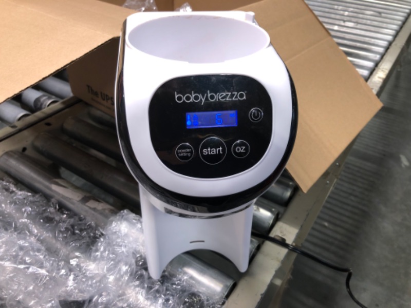 Photo 3 of Baby Brezza Formula Pro Mini Baby Formula Maker – Small Baby Formula Mixer Machine Fits Small Spaces and is Portable for Travel– Bottle Makers Makes The Perfect Bottle for Your Infant On The Go