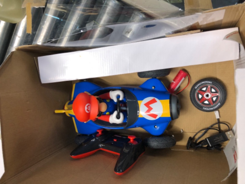 Photo 3 of Carrera 181066 RC Official Licensed Kart Mach 8 Mario 1: 18 Scale 2.4 Ghz Remote Radio Control Car with Rechargeable Lifepo4 Battery - Kids Toys Boys/Girls Mario Kart Mach 8 - Mario