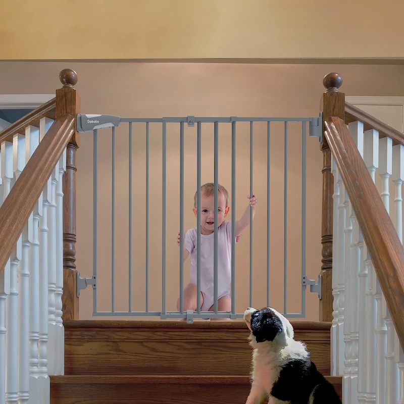 Photo 1 of Babelio 26-43" Auto Close Baby/Dog Gate for Stairs, 2-in-1 Easy Swing Doorway and Hallway Pet Gate, with Extra-Wide Walk Thru Door and Threshold-Free Design, Gray
