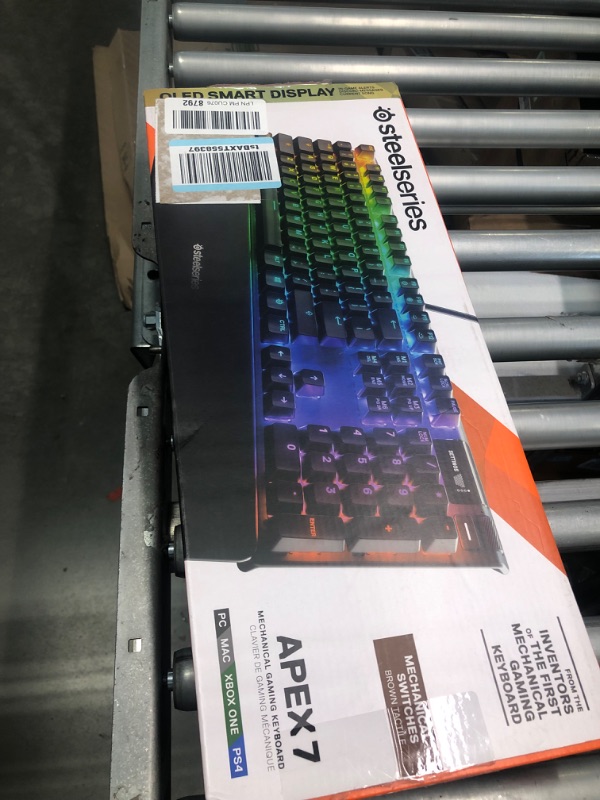 Photo 1 of SteelSeries Apex 7 Mechanical Gaming Keyboard – OLED Smart Display – USB Passthrough and Media Controls – Tactile and Quiet – RGB Backlit (Brown Switch) Apex 7 Brown – Tactile & Quiet Keyboard