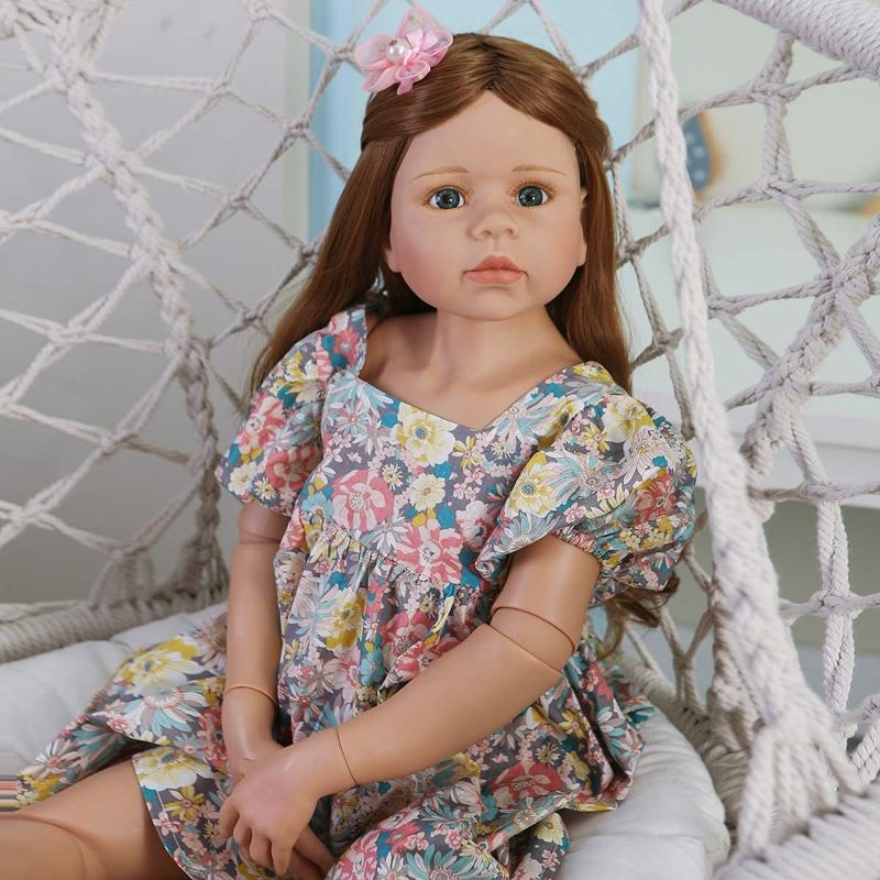 Photo 1 of Buby 39inch Reborn Toddler Dolls,Huge Baby Full Body Hard Vinyl Smile Girl Realistic Standing Girls Brown Hair Girl Model Collectible Ball Jointed Doll (Flower Dress)
