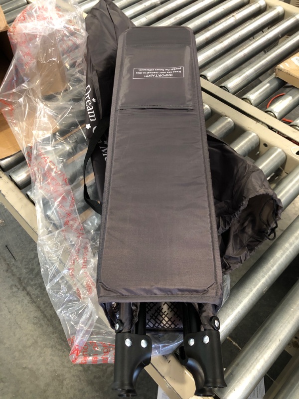 Photo 1 of Dream On Me Zoom Portable Playard in Dark Grey, Lightweight, Packable and Easy Setup Baby Playard, Breathable Mesh Sides and Soft Fabric - Comes with a Removable Padded Mat