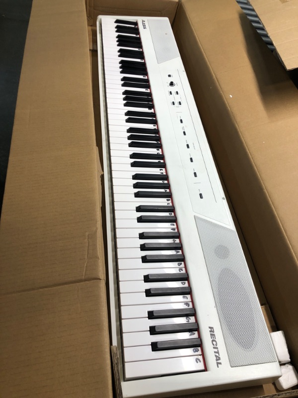 Photo 4 of Alesis Recital – 88 Key Digital Piano Keyboard with Semi Weighted Keys, 5 Voices, Piano Lessons, M-Audio Sustain Pedal and HDH40 White Piano + Sustain Pedal + Headphones

no cables/ unable to test