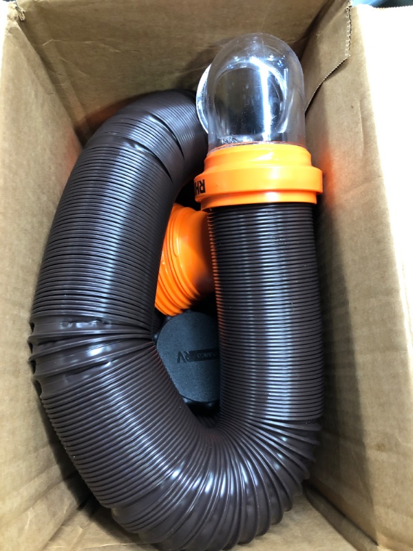 Photo 1 of Camco RhinoFLEX RV Sewer Hose Kit with Swivel Transparent Elbow and 4-in-1 Dump Station Fitting, Brown, 15 Feet (39770) 15ft Sewer Hose Kit Frustration-Free Packaging