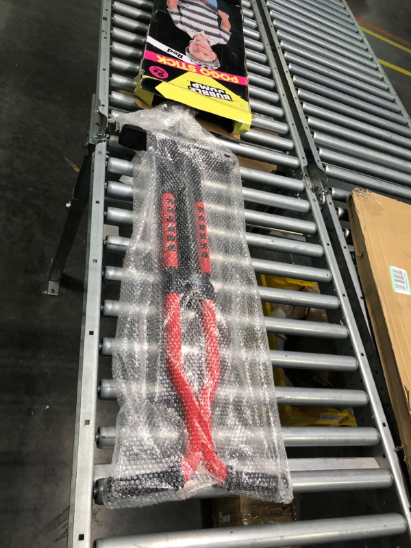 Photo 1 of BUBBLE JUMP Pogo Stick for Kids Age 10 and up (Red) - for Boys, Girls, Teens & Adults 80 to 160 Lbs - Easy Grip Rubber Handle Master Jumper Pogo Sticks - High Jumping Kids Pogo Stick