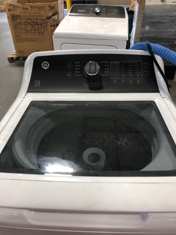 Photo 3 of GE A4.5 cu. ft. Water Level Control Top Load Washer in White