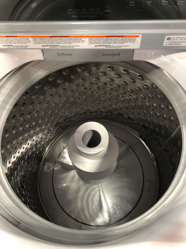 Photo 7 of GE A4.5 cu. ft. Water Level Control Top Load Washer in White