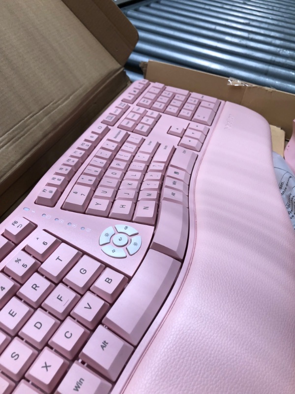 Photo 4 of MEETION Ergonomic Keyboard, Split Wireless Keyboard with Cushioned Wrist, Palm Rest, Curved, Natural Typing Full Size Rechargeable Keyboard with USB-C Adapter for PC/Computer/Laptop/Windows/Mac, Pink
