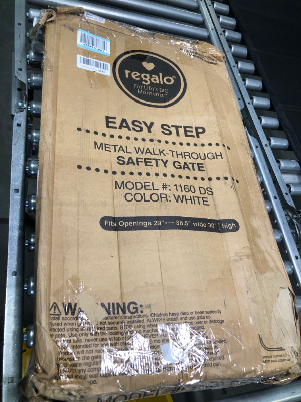 Photo 1 of Regalo Easy Step 36" Extra Tall Walk Thru Baby Gate, Includes 4-Inch Extension Kit, 4 Pack of Pressure Mount Kit and 4 Pack Wall Cups and Mounting Kit, Pack of 1