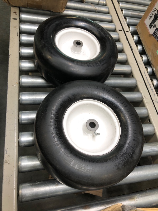 Photo 3 of 2 PCS Upgrade 13x5.00-6 Flat Free Lawn Mower Tire and Wheel with 3/4" & 5/8" Grease Bushing, Zero Turn Mower Front Solid Tire Assembly for Commercial Grade Lawn, Garden Turf, 3.25"-5.9" Centered Hub
***Missing two of the smaller rings***
