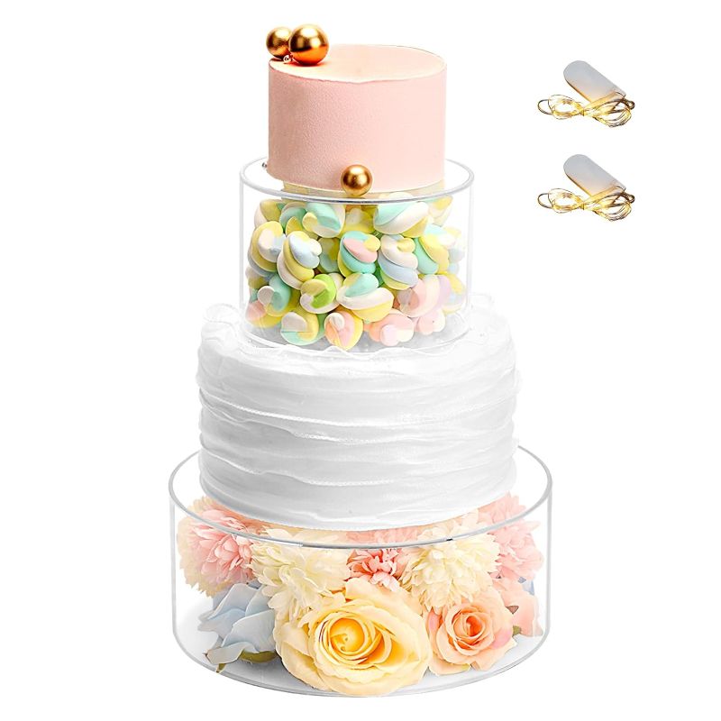 Photo 1 of  3pcs Clear Acrylic Cake Stand with Lid Fillable Cake Stand Cake Riser Cake Tier Cake Display Round Cake Stand Wedding Cake Stand Cylinder Stand for Party Birthday
***Stock photo is a similar item, not exact***