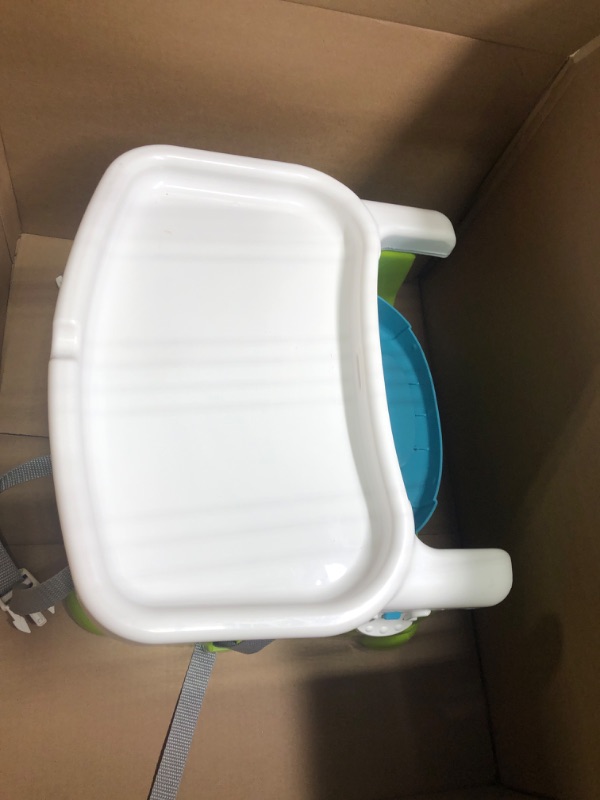 Photo 1 of Fisher-Price Portable Toddler Booster Seat, Healthy Care, Travel Dining Chair with Dishwasher Safe Tray, Green Blue/Green