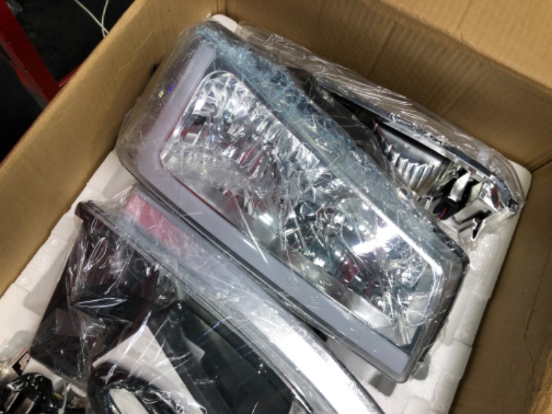 Photo 1 of GORWARE Headlight Assembly w/LED DRL Compatible with 2003-2006 Chevy Silverado Avalanche 1500 2500 3500/2007 Classic with Chrome Housing Clear Lens and Reflector