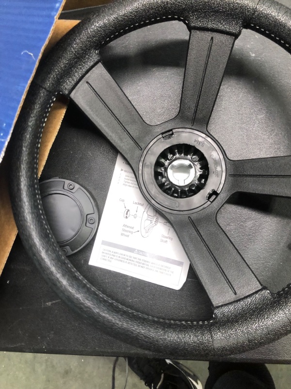 Photo 1 of Attwood 8315-4 Weatherproof 13-Inch Marine Boat Soft-Grip Steering Wheel with Cap