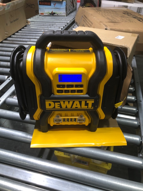 Photo 2 of DEWALT DXAEPS14 1600 Peak Battery Amp 12V Automotive Jump Starter/Power Station with 500 Watt AC Power Inverter, 120 PSI Digital Compressor, and USB Power , Yellow