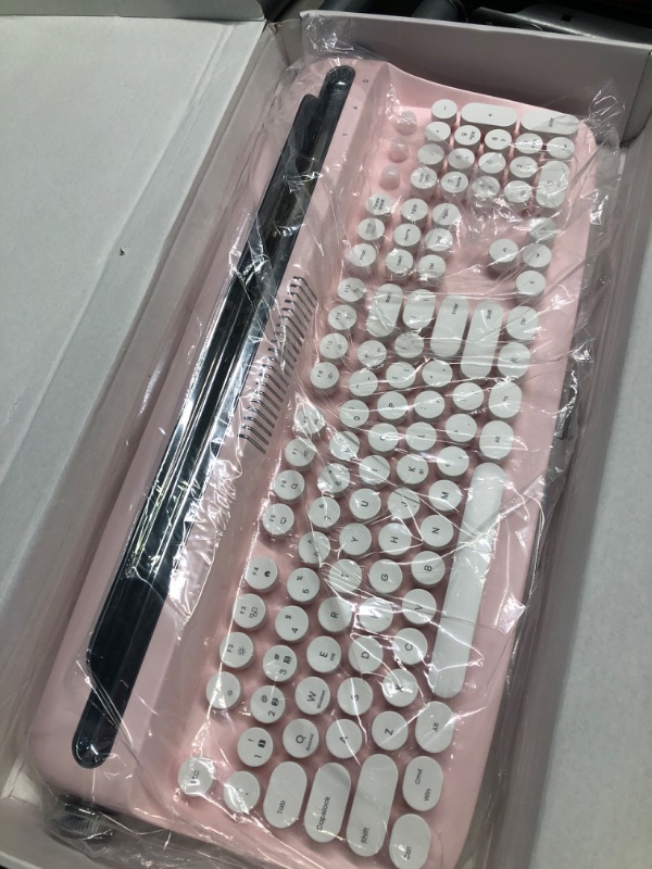 Photo 1 of YUNZII ACTTO B503 Wireless Typewriter Keyboard, Retro Bluetooth Keyboard with Integrated Stand for Multi-Device (B503, Baby Pink) B503 Baby Pink