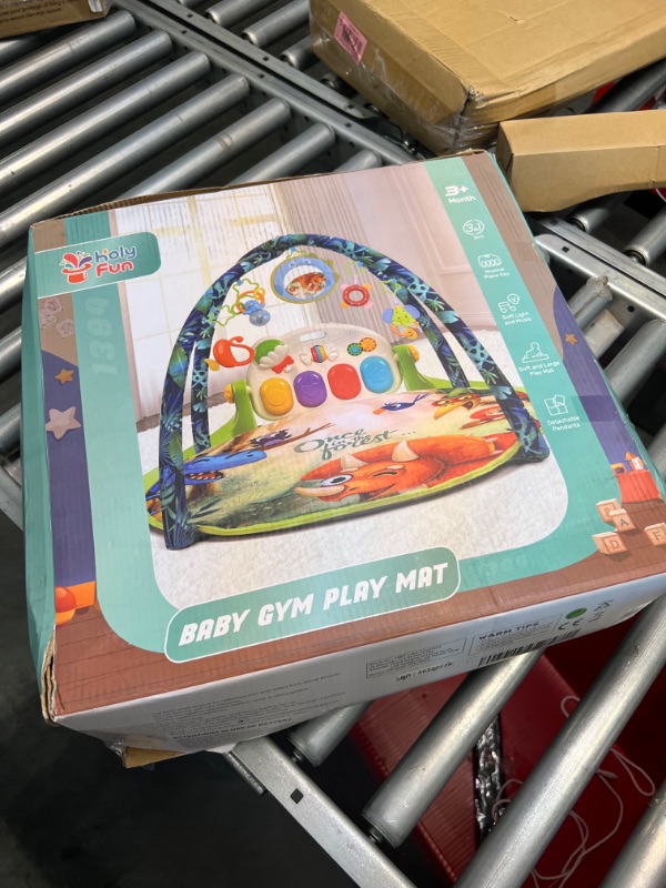 Photo 1 of HOLYFUN Baby Gym Play Mat, Kick and Play Piano Gym with 5 Sensory Teether Toys, Multifunctional Tummy Time Round Playmats, Musical Activity Center Early Development Gift for Newborn Infants Toddlers