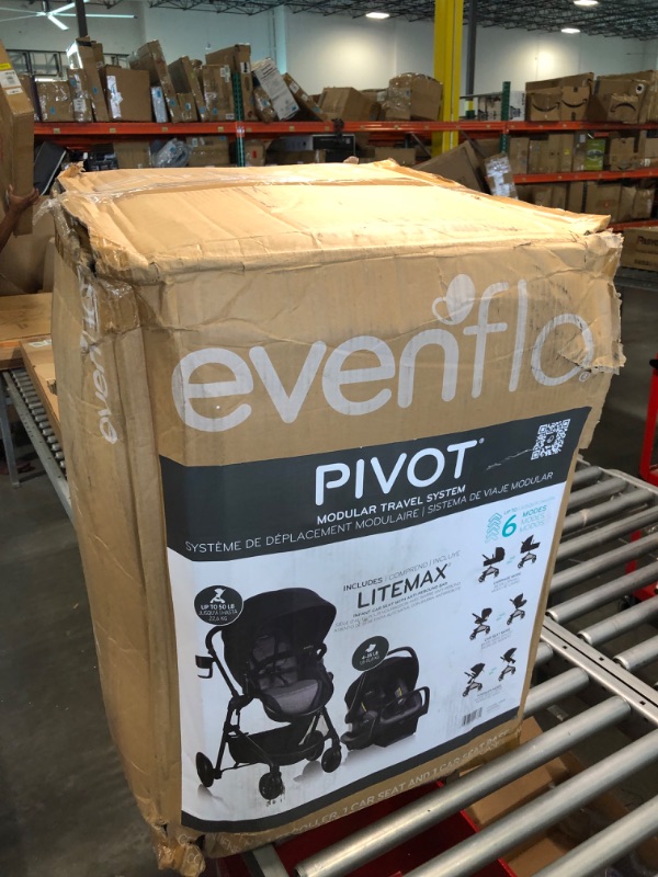 Photo 1 of Evenflo Pivot Modular Travel System with Universal Stroller Organizer Casual Gray With Universal Stroller