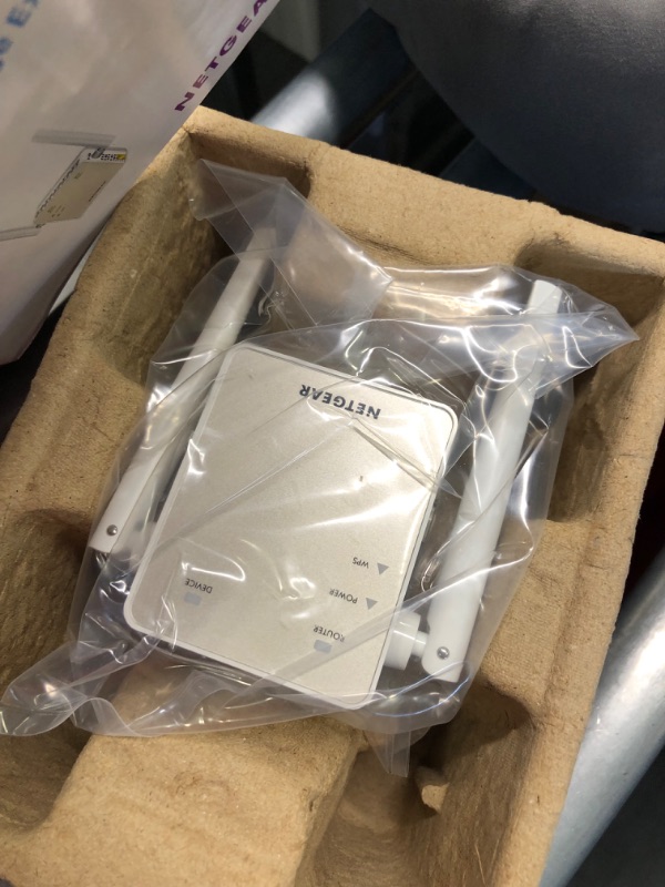 Photo 1 of NETGEAR Wi-Fi Range Extender EX6120 - Coverage Up to 1500 Sq Ft and 25 Devices with AC1200 Dual Band Wireless Signal Booster & Repeater (Up to 1200Mbps Speed), and Compact Wall Plug Design WiFi Extender AC1200