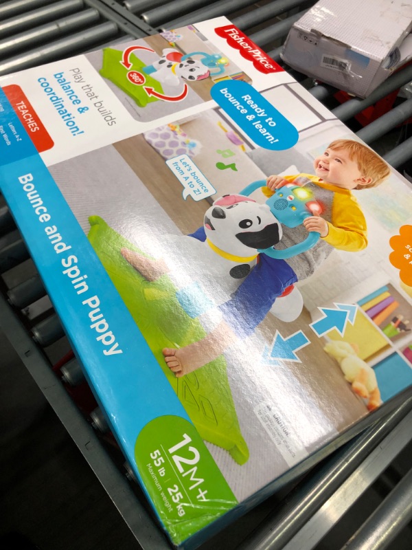 Photo 1 of Fisher-Price Toddler Ride-On Learning Toy, Bounce and Spin Puppy, Stationary Musical Bouncer for Babies and Toddlers Standard