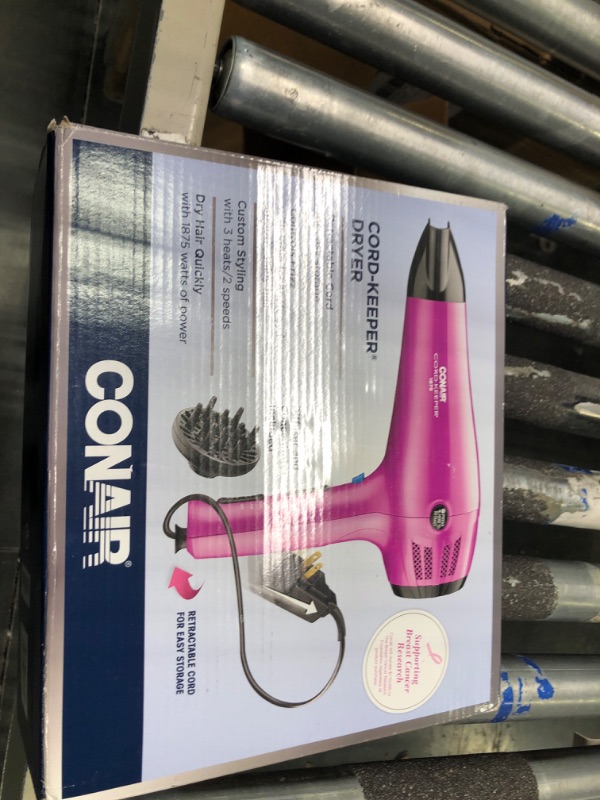 Photo 2 of Conair Hair Dryer with Retractable Cord, 1875W Cord-Keeper Blow Dryer Pink