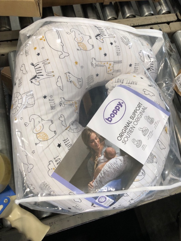 Photo 1 of Boppy Nursing Pillow and Positioner - Original, Notebook Black and White with Gold Animals, Breastfeeding, Bottle Feeding, Baby Support, with Removable Cotton Blend Cover, Awake-Time Support
