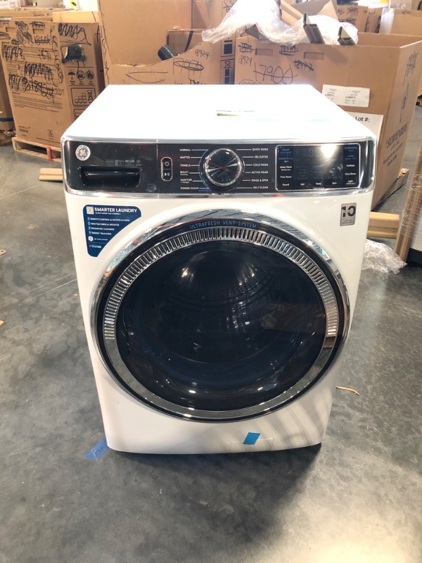 Photo 1 of GE 28" Front Load Steam Washer 5.0 Cu. Ft. with SmartDispense WiFi OdorBlock and Sanitize and Allergen - White